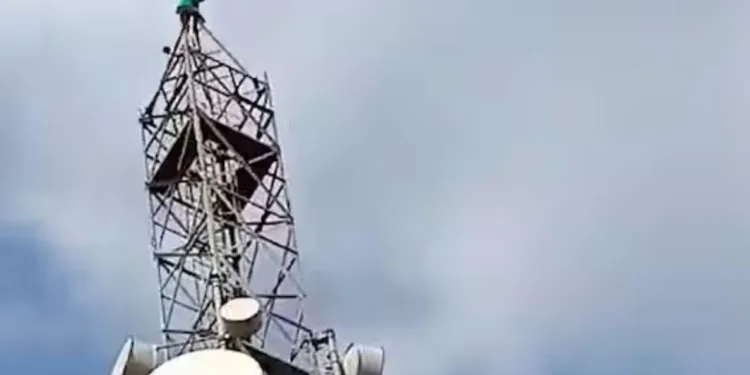 Youth demands Maratha reservation by climbing mobile tower in jamkhed Ahmednagar