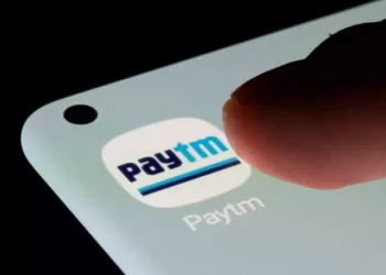 Paytm falls 20% after cutting exposure to small loans