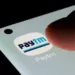 Paytm falls 20% after cutting exposure to small loans