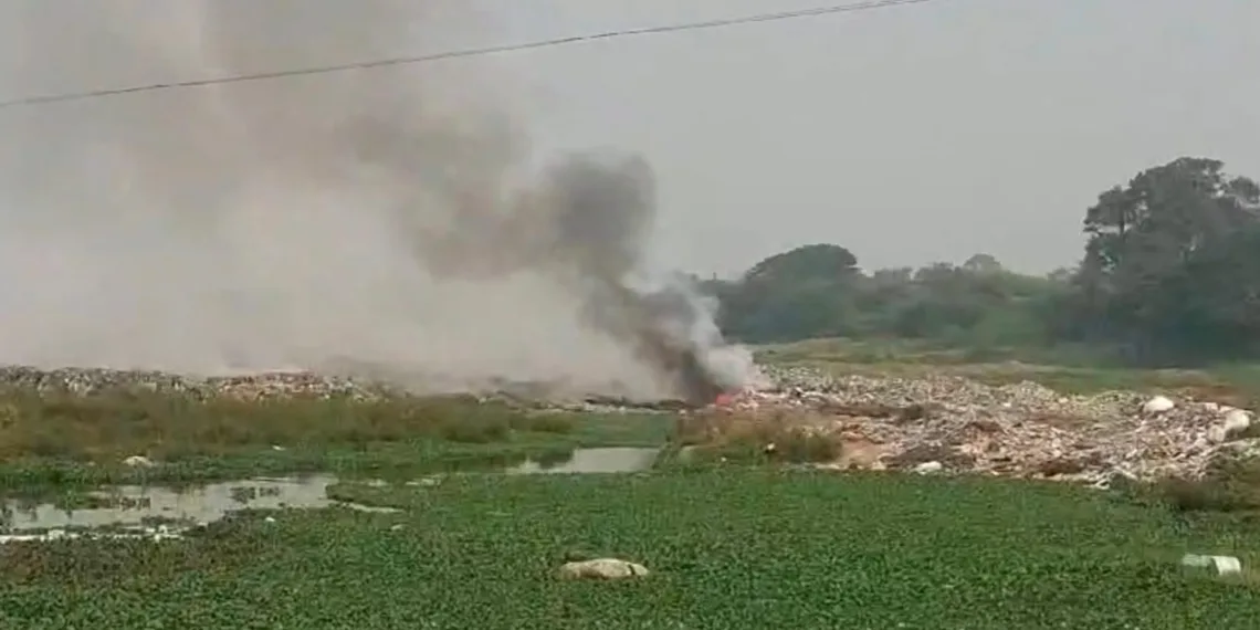 Garbage caught with fire mula mutha river bank in loni kalbhor pune