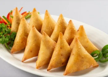 condom and stone found in samosa in pune